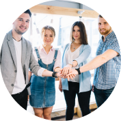 LogiQuad Solutions - four colleagues stacking hands together